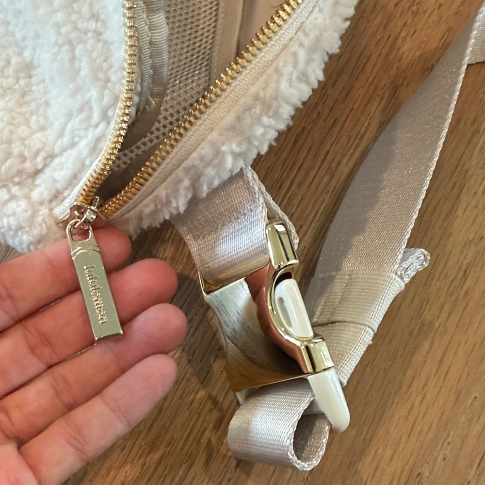 lululemon athletica Cream Sherpa Waist Bag with Gold Hardware